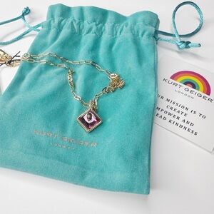 Kurt Geiger Gold Eagle Necklace with Pink Gemstone